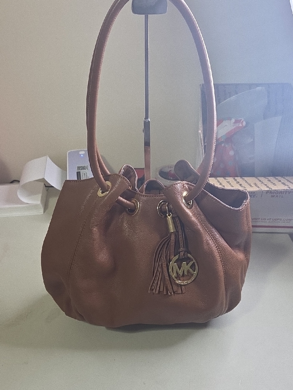 Michael Kors Brown Leather Drawstring Shoulder Bag with Tassel Charm